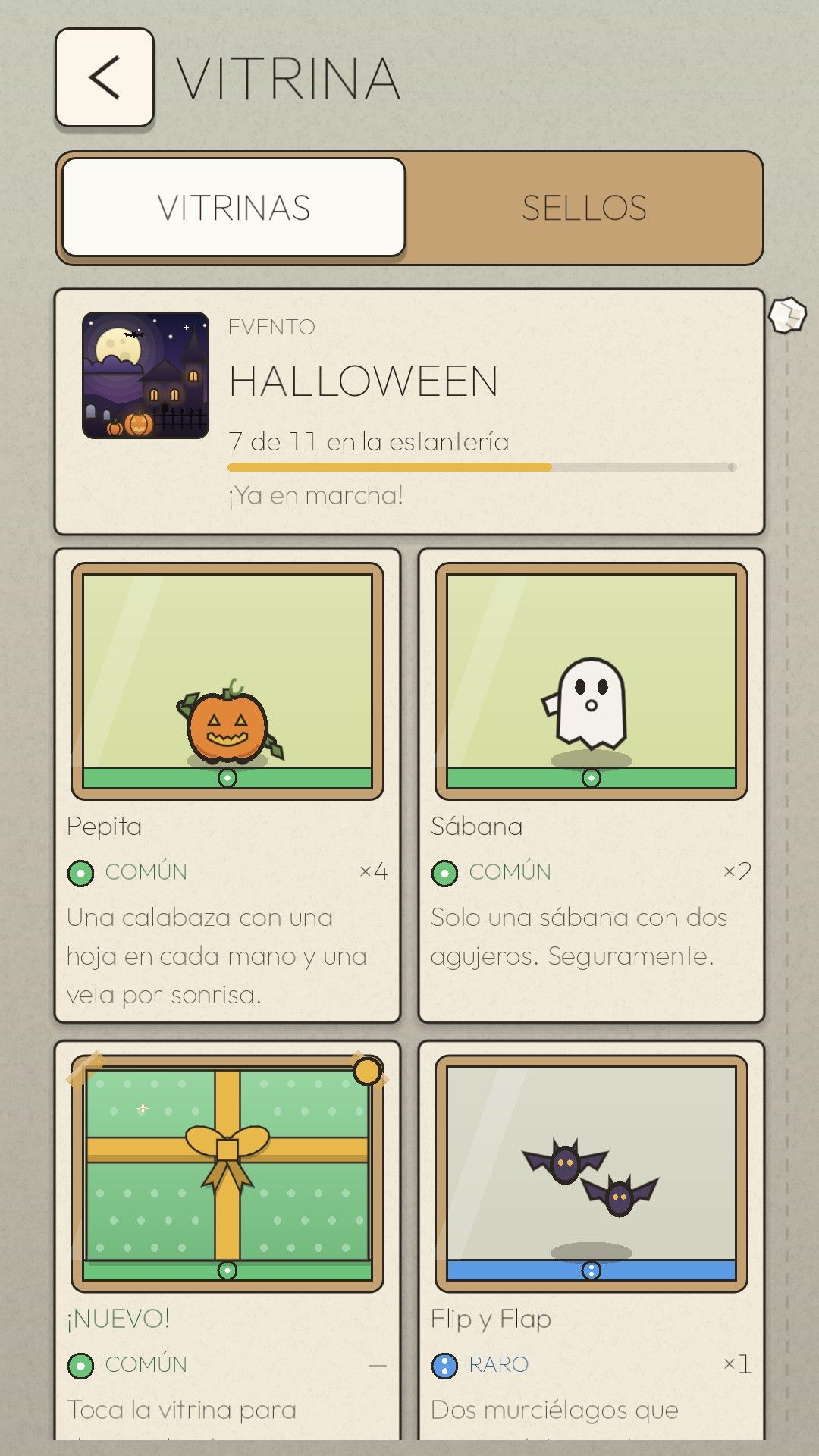 La página del evento de Halloween en la Vitrina, con 7 de 11 figuras: Pepita, Sábana, una figura nueva envuelta y Flip y Flap en sus vitrinas